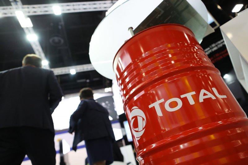 The logo of Total SA sits on an oil drum in the corporate hall at the St Petersburg International Economic Forum (SPIEF) in Saint Petersburg, Russia, on Thursday, May 24, 2018. The economic forum this year will be attended by President Vladimir Putin and