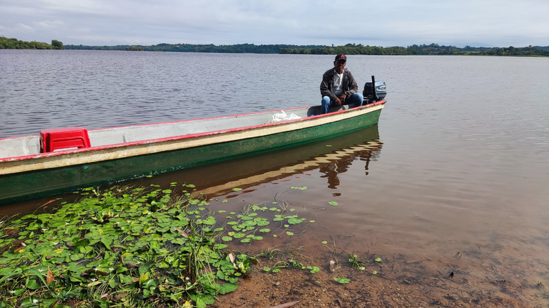 A fisherman on the bank of Ciénaga San Silvestre, a freshwater swamp situated downstream of the landfill